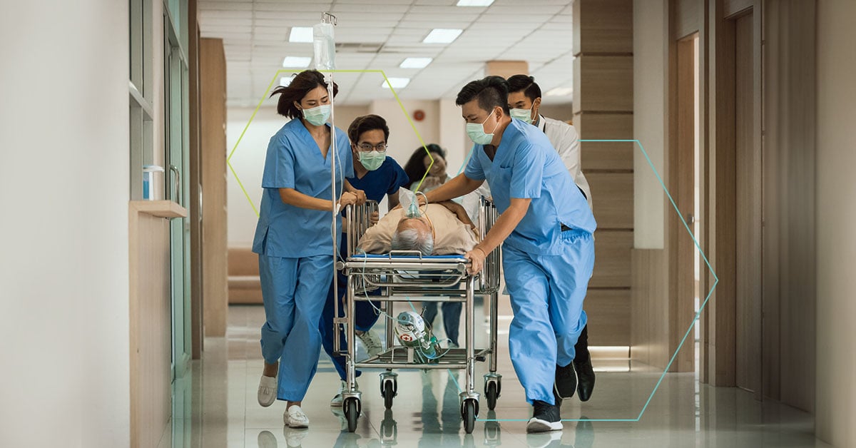 nurses rushing patient to the emergency department