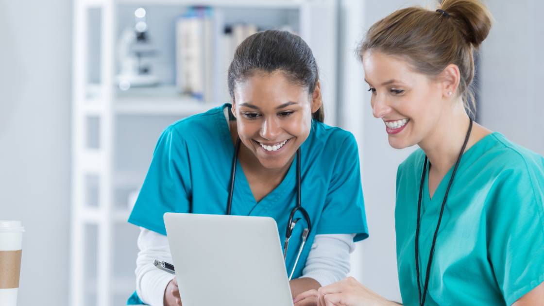 Nurses reviewing paperwork